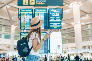 A View From The Back An Unrecognizable Tourist Girl In A Straw Hat Stands Near The Board With A View From The Back An Unrecognizable Tourist Girl In A Straw Hat Stands Near The Board With